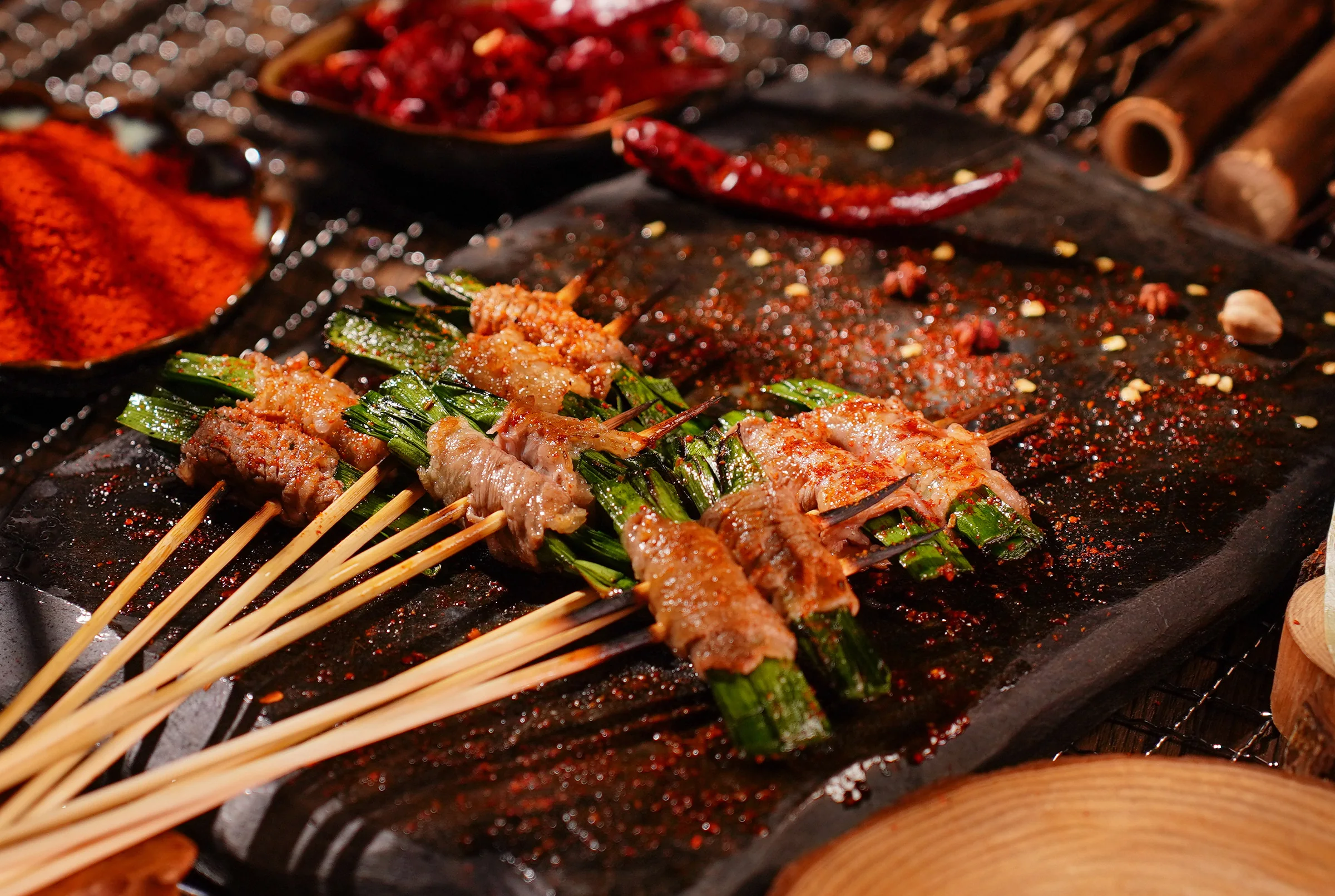 Wrapped skewers with dried chillies and spices