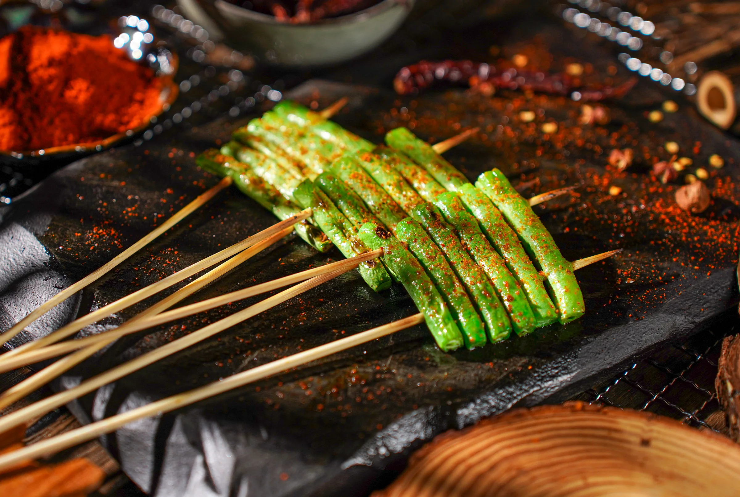 Charred green bean skewers