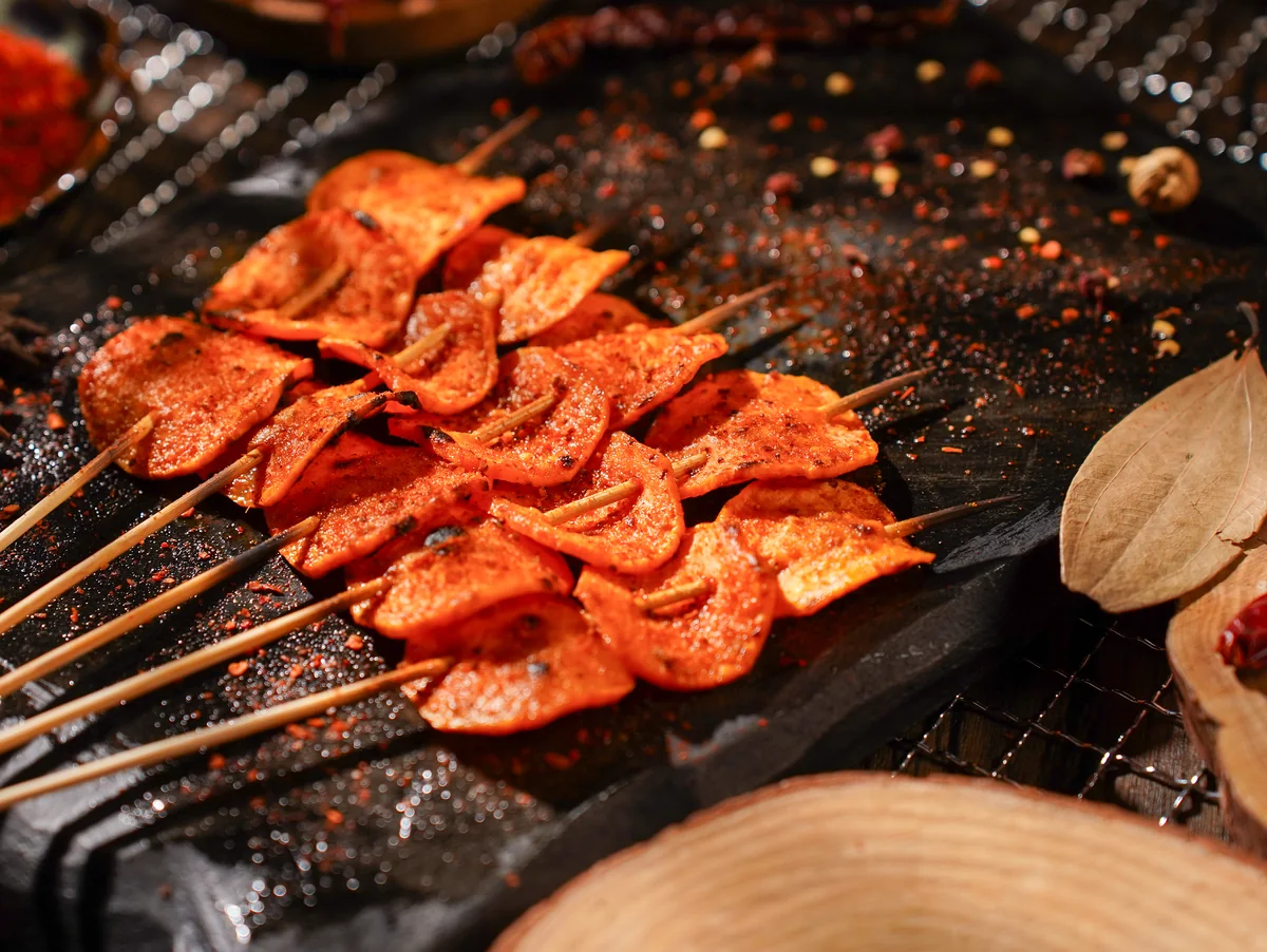 Sweet potato slice skewers glazed with chilli