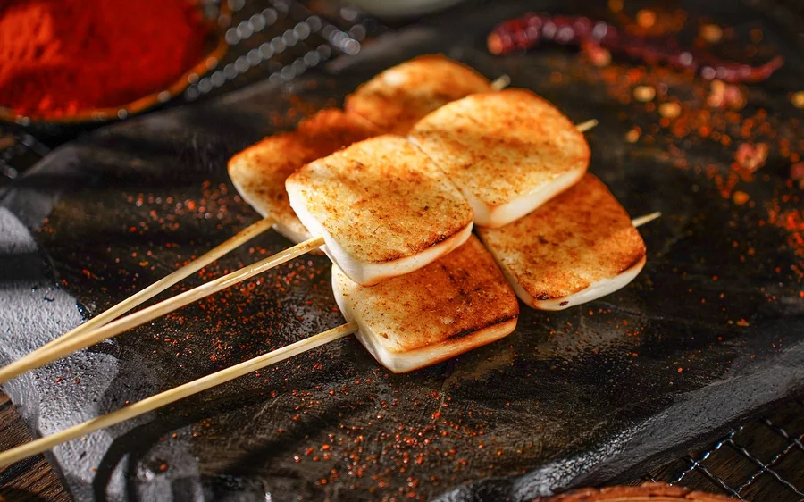 Golden grilled mantou skewers